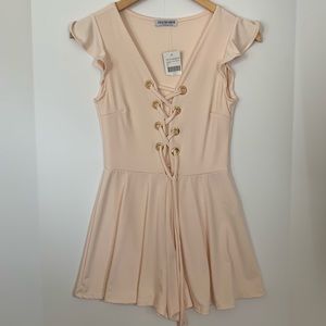 Baby pink romper with cute sleeves